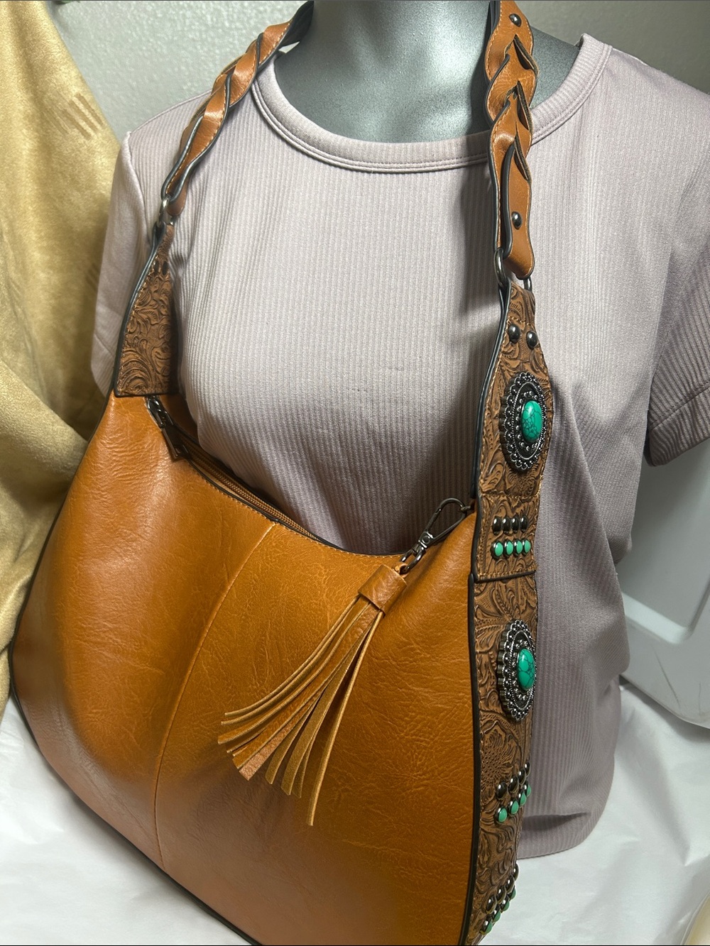 Stylish Tan Hobo Bag with Turquoise Accents